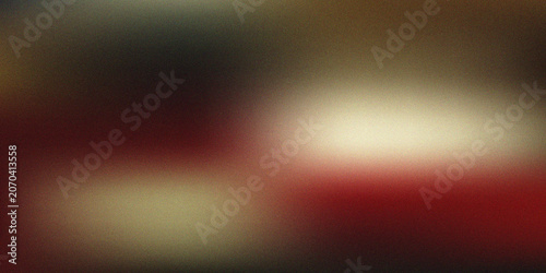 Abstract grainy gradient background with dark red, gold, and cinematic moody tones