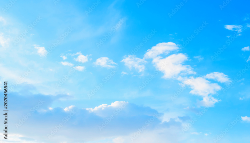Obraz premium Pastel morning sky landscape, soft white clouds in the picturesque blue sky