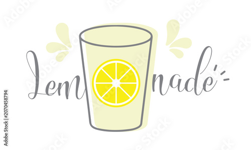 Refreshing lemonade in a glass cup. Inscription lemonade where the letter O is a round slice of lemon.