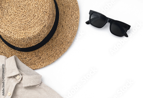 Summer travel essentials flat lay with straw hat and sunglasses vacation sunglasses accessories lifestyle clothing background overhead