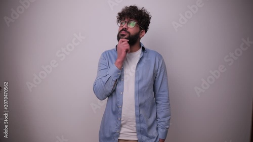 Thoughtful young man thinking and finding a solution
