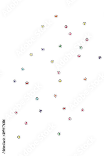 Real heart-shaped beads in assorted pastel colors scattered across a black background. Decorative bead overlay featuring colorful acrylic heart beads arranged in a playful composition with handcrafted