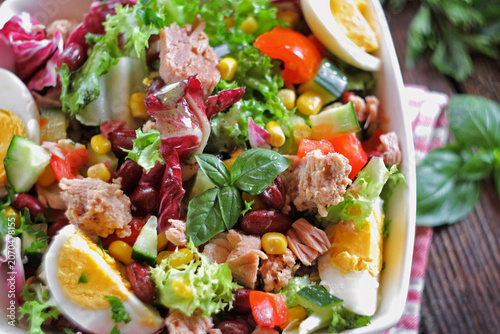 Tableau sur toile Fresh Tuna and Egg Salad on wooden background