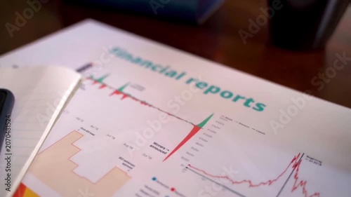 Financial report document with market trends chart and professional analytics charts graphs data analysis business