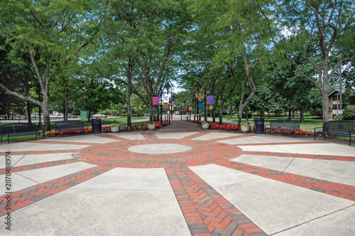 Public Park Court and Promenade with Summer Flowers