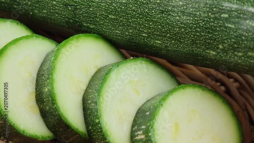 Fresh zucchini in a basket.	