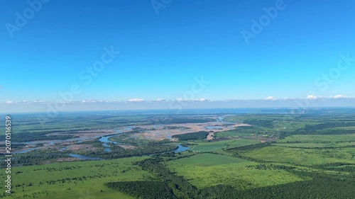 Aerial view to the river in flight