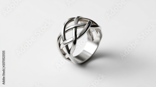 Elegant silver ring with intricate geometric design.