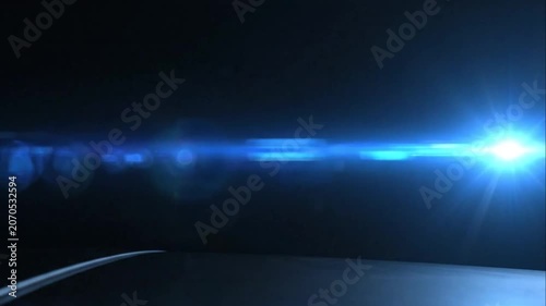 Blue light streak in dark space.