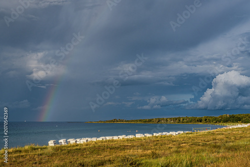 Rainbow over the Baltic Sea at Boltenhagen beach in the evening