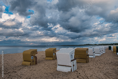 Beach chairs on the empty beach of Boltenhagen on the Baltic Sea in the evening
