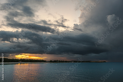 Evening atmosphere during a picturesque sunset at the beach in Boltenhagen on the Baltic Sea.