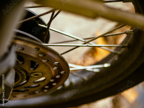 Extreme Close-Up Motorcycle Brake Disc Rotor with Spoke Detail Vintage Tone Macro