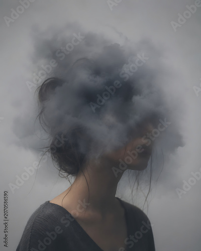 Woman with cloud covering her face – brain fog and mental health concept