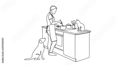 A woman cooking in the kitchen with her pet dog and cat.