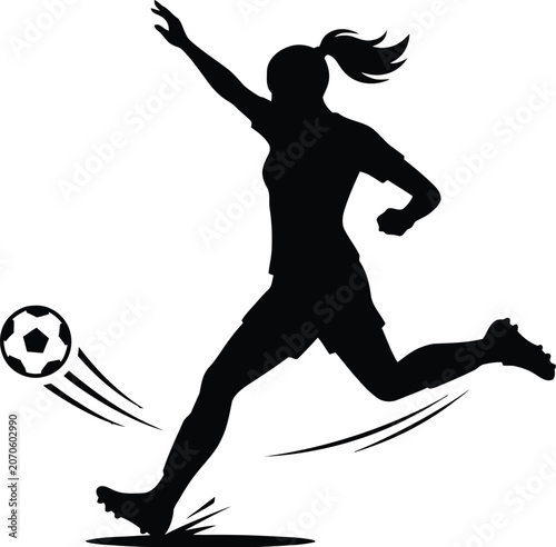 Female soccer player kicking a ball