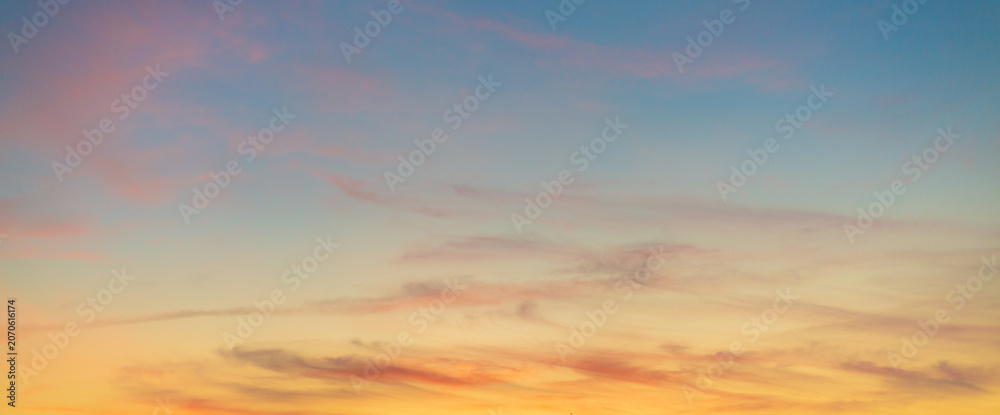 Fototapeta premium Beautiful colorful sunset sky with soft clouds