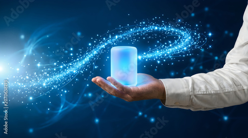 Human hand holding a glowing digital cylinder representing futuristic data storage and cloud technology.