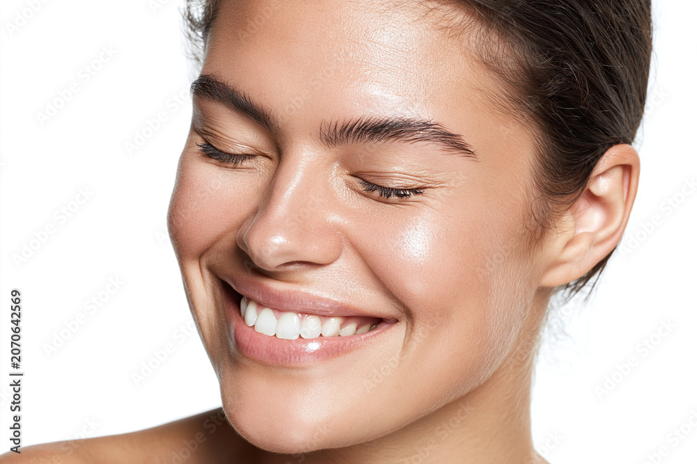 Obraz premium Radiant youthful skin close up portrait smiling woman with healthy complexion and eyes closed, natural makeup and glowing cheek highlight
