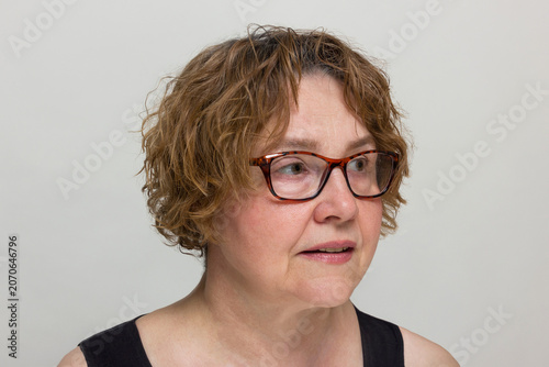 Right three quarter view portrait of mature woman for reference dataset.