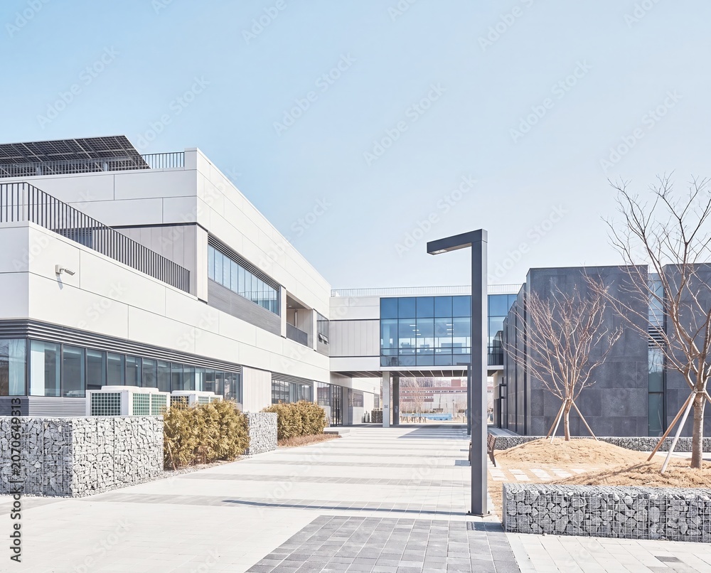 Fototapeta premium Modern research campus with minimalist landscaping