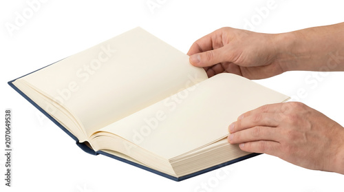 Foto Hands opening a large book.