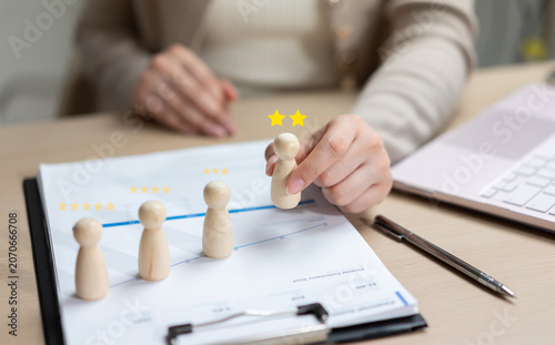 Foto Employee performance evaluation and customer satisfaction concept with rating stars, business review metrics and team assessment