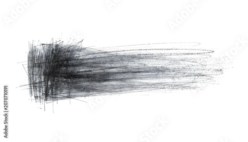 A dark gray brush stroke on a white background with varying shades of gray