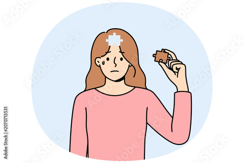 Depressed woman cries, feeling lack of motivation for development, and pulls piece of puzzle out of head. Girl with mental health disorder crying, needing support from friends and boyfriend