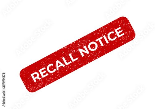 Red grunge rubber stamp with the text recall notice on a document