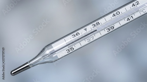 Clinical thermometer displaying measurement in centigrade scale  