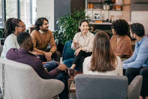 Employee resource group meeting in inclusive office