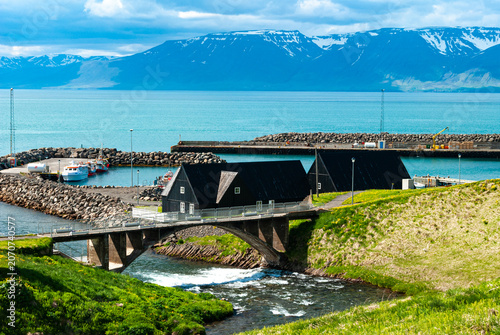 The Icelandic Emigration Center in Hofsós Iceland with traditional black timber houses overlooking Skagafjörður and scenic coastal surroundings