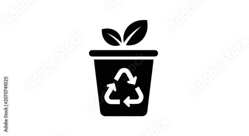 Recycling symbol with green leaf growing.