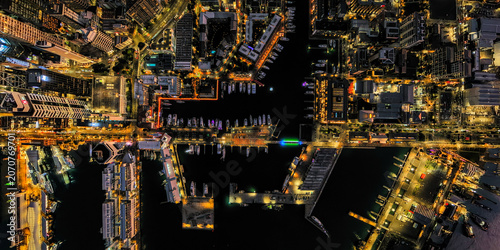 Tableau sur toile Aerial view of the bustling city harbour at night, Auckland, New Zealand
