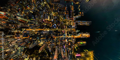 Tablou pe pânză Aerial view of the bustling city harbour at night, Auckland, New Zealand