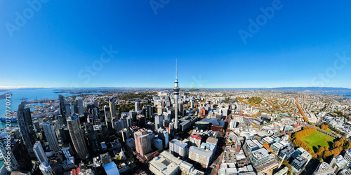 Aerial footage of central Auckland, New Zealand and the Sky Tower landmark