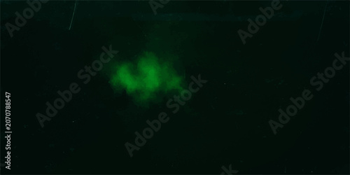 Fotografie Bright green toxic smoke cloud isolated on pitch black background with copy spac