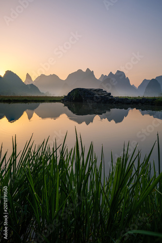 Sunrise Reflection over Karst Mountains in Guilin, China