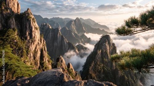 Mountain peaks amidst misty clouds