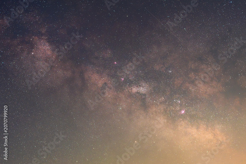 A breathtaking view of the Milky Way stretching across a clear night sky filled with countless stars. 