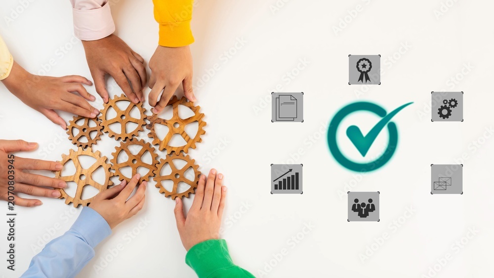 Obraz premium Collaborative Hands Placing Gears on Table with Icons Representing Success, Strategy, Teamwork, and Project Management for Business Concept Gluon.