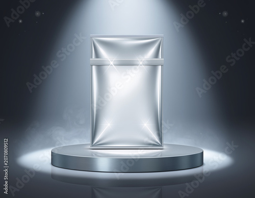 Shiny new product package standing on pedestal with spotlight illumination