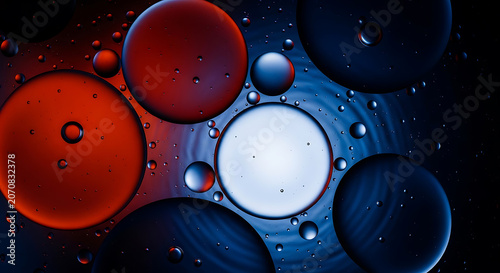 Colorful oil droplets in water a macro photograph with ripple effects