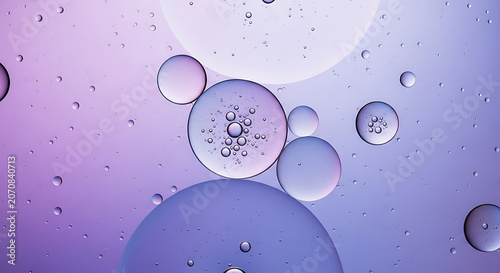 Bubbles in water a macro photograph with iridescent purple and blue hues