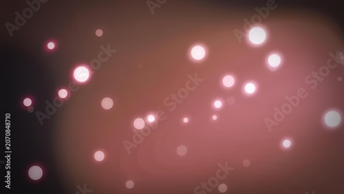 Pink glowing bokeh lights on dark background