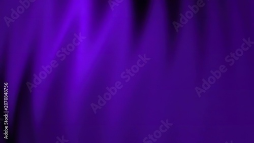 Purple stage lights shining in a dark concert setting