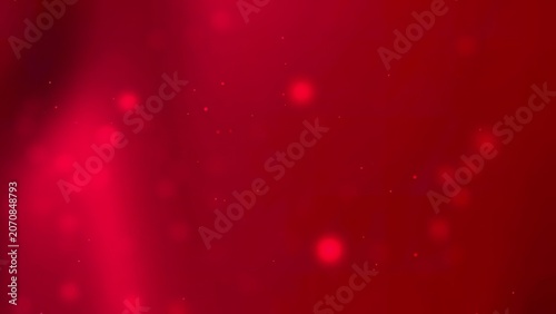 Red bokeh lights glowing in a dark background