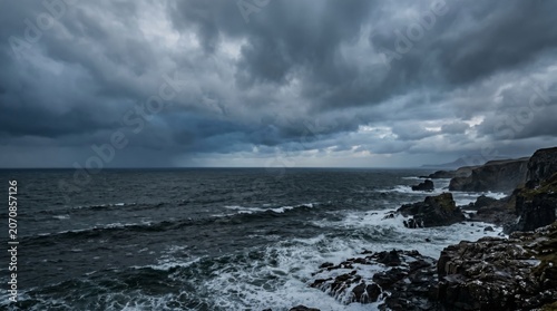 Storm Clouds Gather Over Rocky Coastline With Waves Crashing on Shore