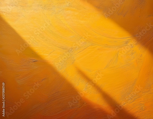 abstract textured background with warm yellow and orange paint washes and dappled natural shadow patterns